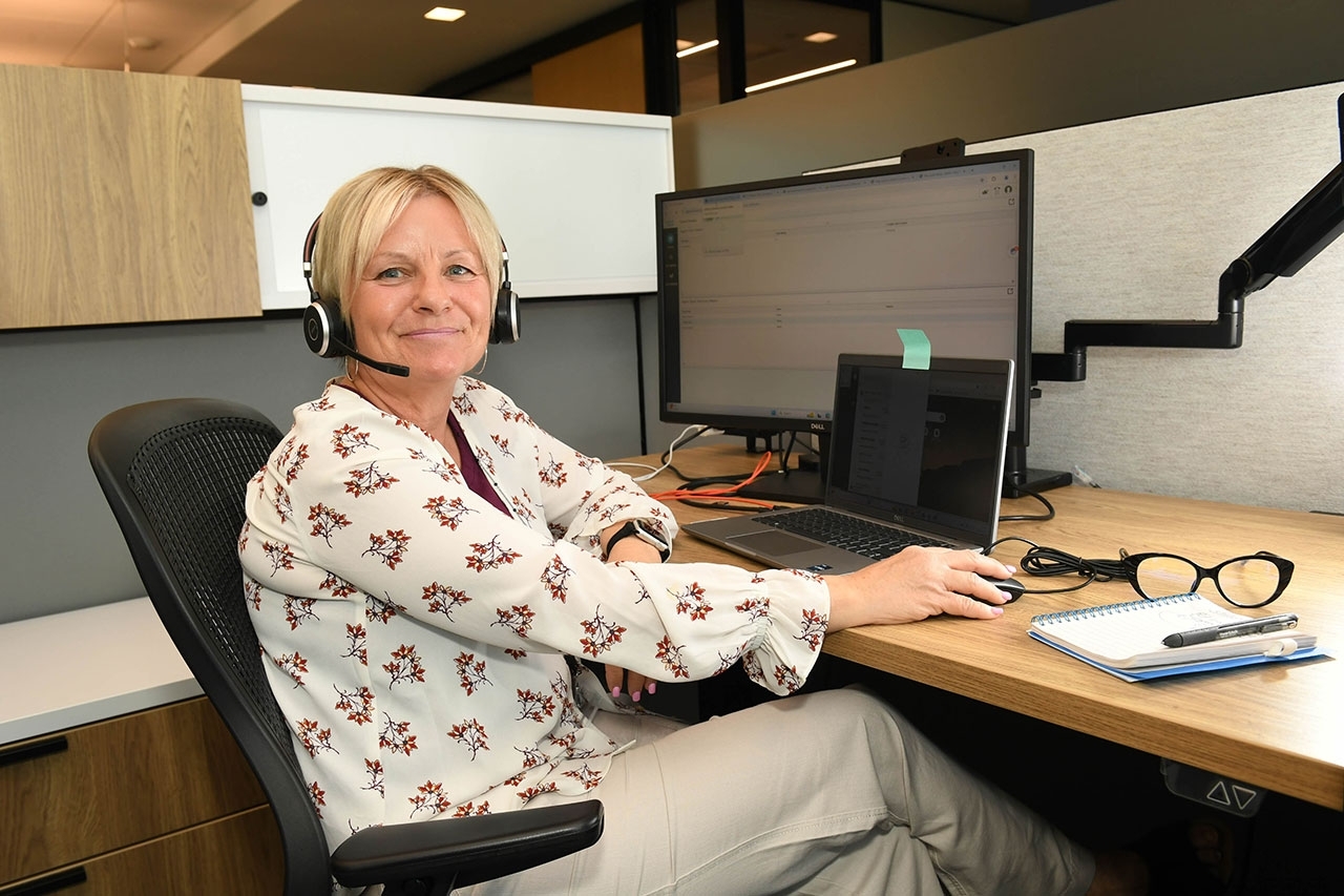 APHIS Customer Service rep APHIS customer service rep sitting at their desk