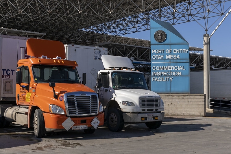 Agricultural commodities imported via trucks await risk-based sampling port-of-entry inspections at the Otay Mesa, CA, commercial inspection facility.